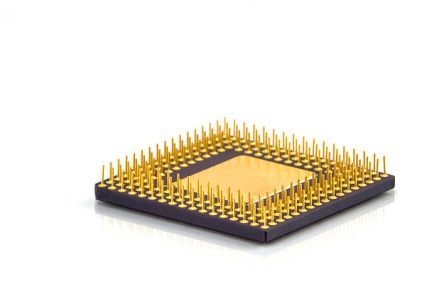 Computer CPU processor isolated on white background with a bit of reflective finish making the image look very classy.